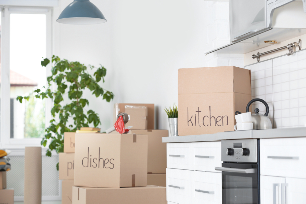 House Furniture Movers packing household items in a Dubai home